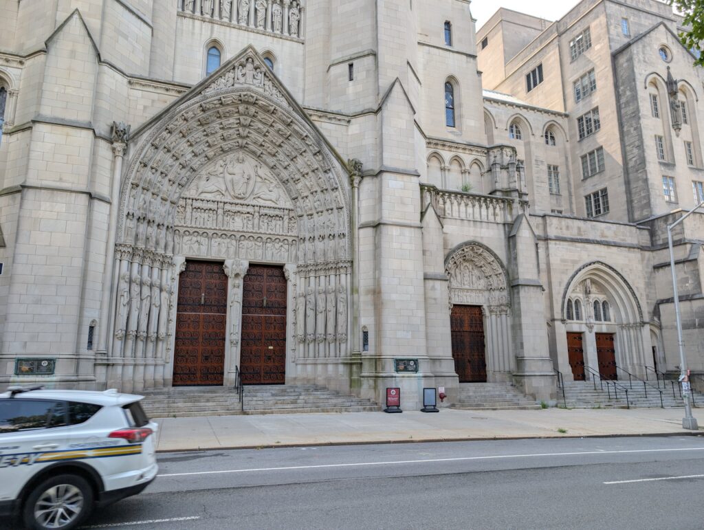 Historic stone and wood church portal after restoration work at Riverside Church