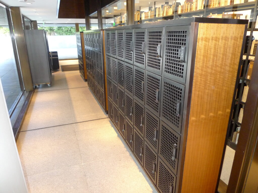 Custom bronze-mesh lockers with teak end panels fabricated for Yale Beinecke Rare Book and Manuscript Library