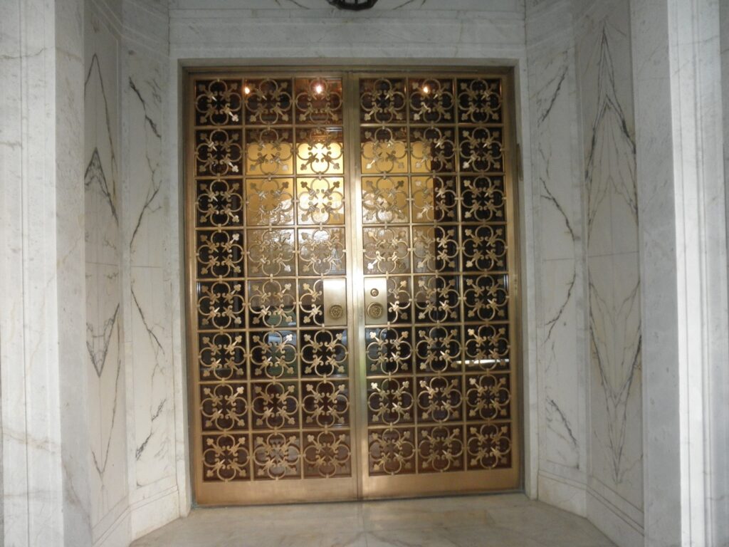 Bronze door restoration and fabrication by Olek